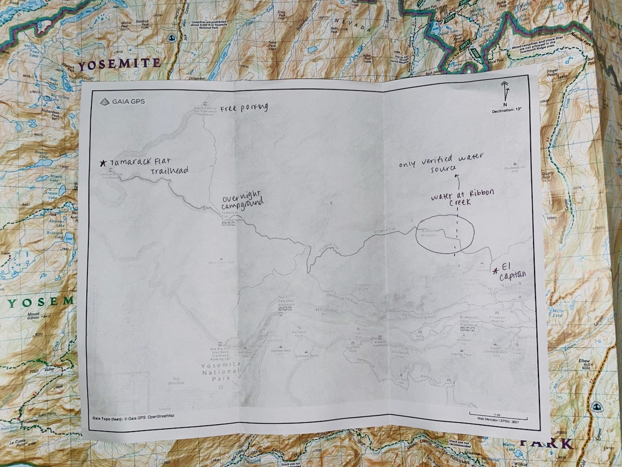 backpacking guide: Annotated paper map on top of National Geographic map